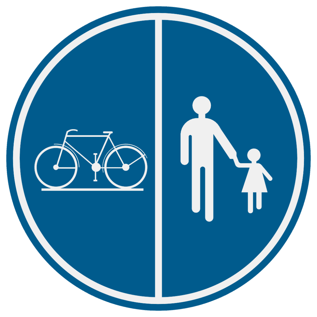 Signal D9 à fond bleu : vélo à gauche et piétons à droite, séparés par une ligne blanche verticale.