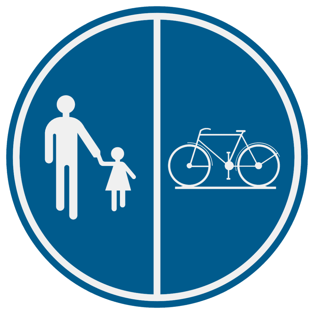Signal D9 à fond bleu : piétons à gauche et vélo à droite, séparés par une ligne blanche verticale.
