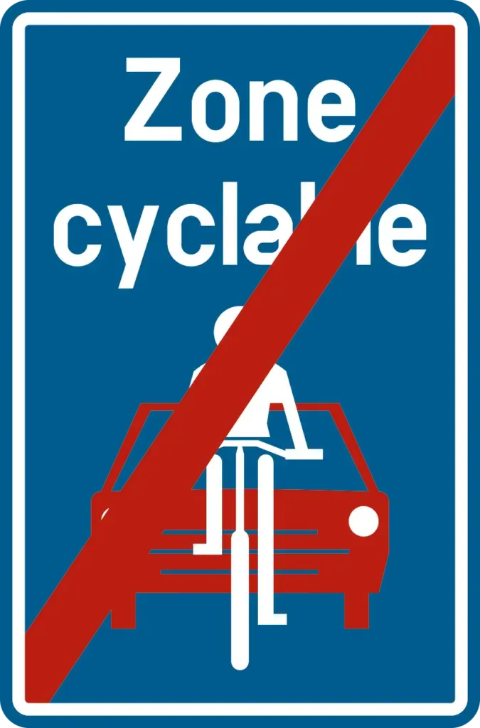 Signal F113 : panneau « Zone cyclable » avec un cycliste et une voiture, barré d’une diagonale rouge.