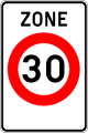 Signal F4a : panneau « ZONE » avec un disque de limitation à 30 km/h.